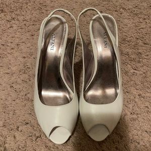 Women’s white Alfani sling back heels.